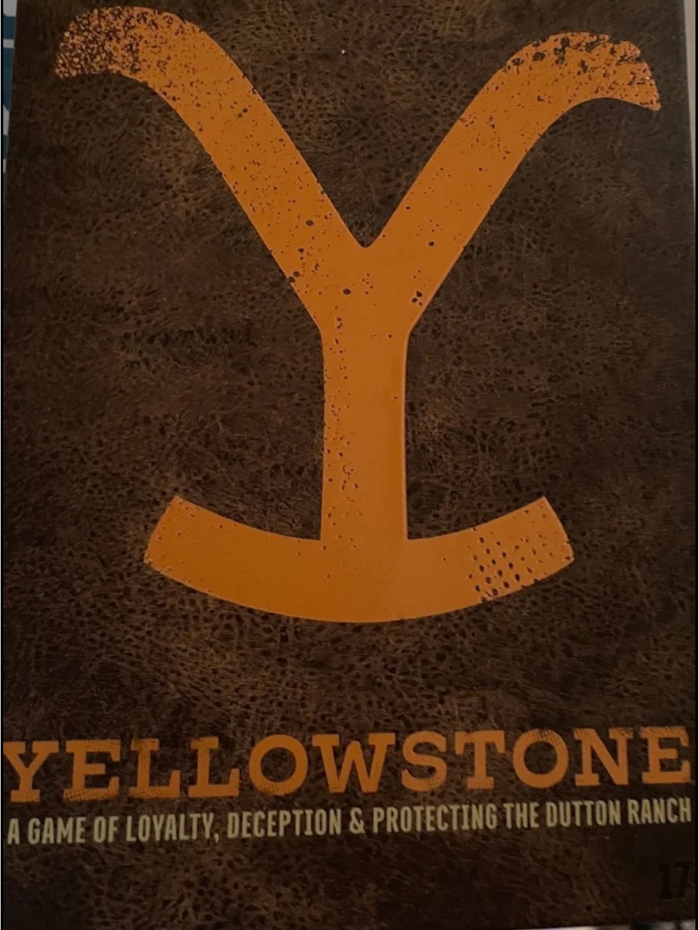 Yellowstone Board Game - Bold Yellow Logo on Brown